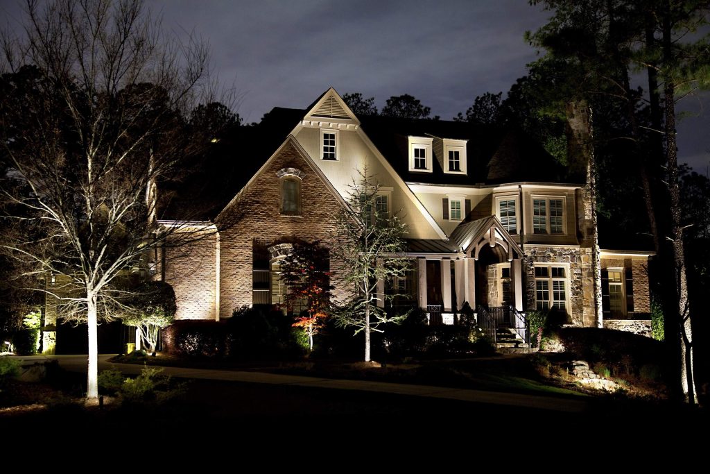 building with landscape accent lighting