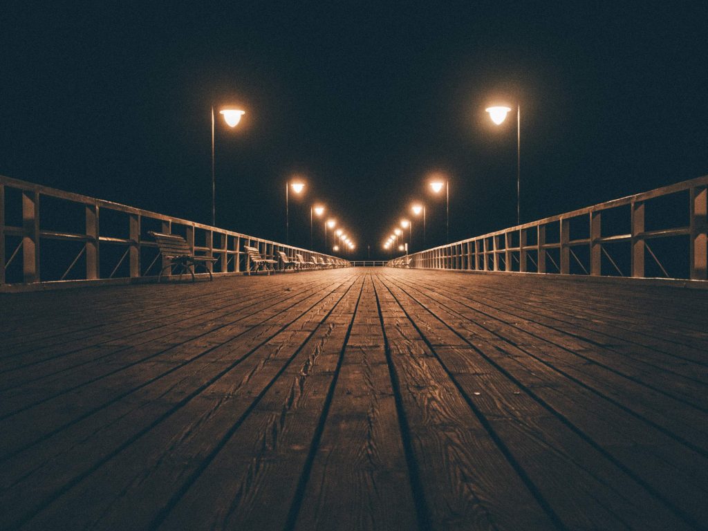 boardwalk with downlights on poles