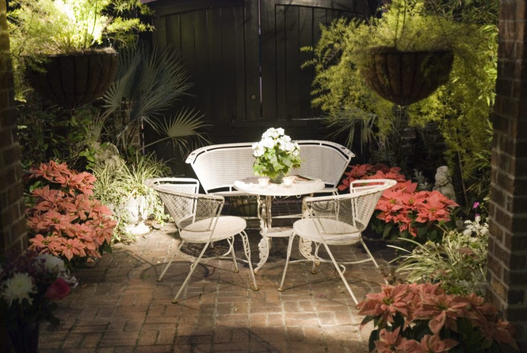 landscape cross lighting on a patio