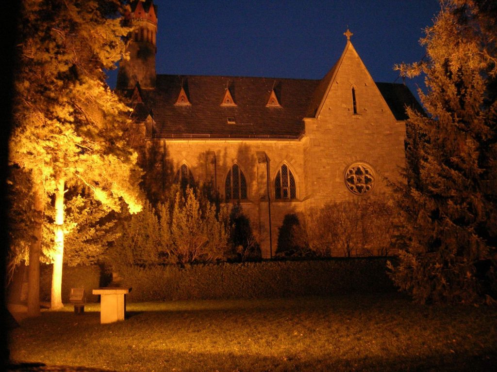 spotlighting a building and some trees