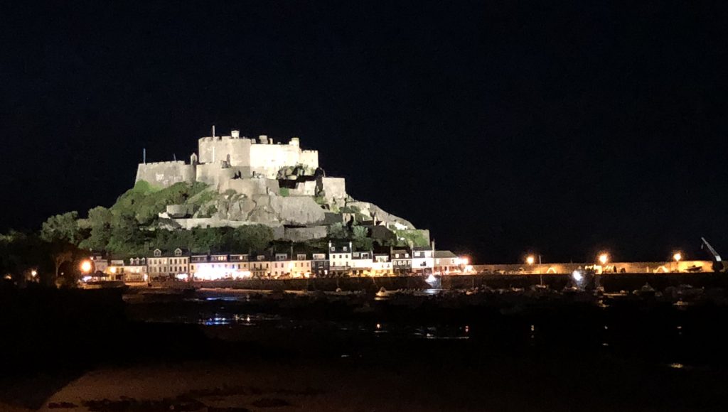 landscape flood lights on a village and a castle