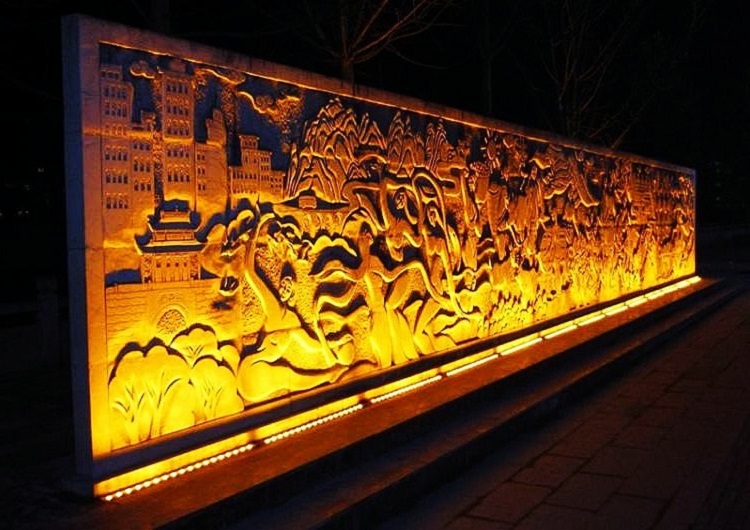 bas-relief with wall wash lighting