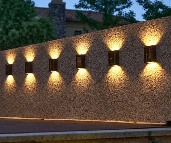 grazing lighting on wall fence