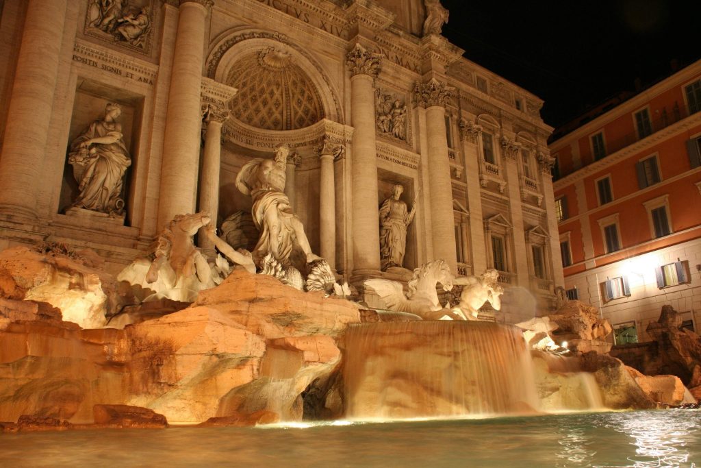 lighted sculptures placed near the water feature