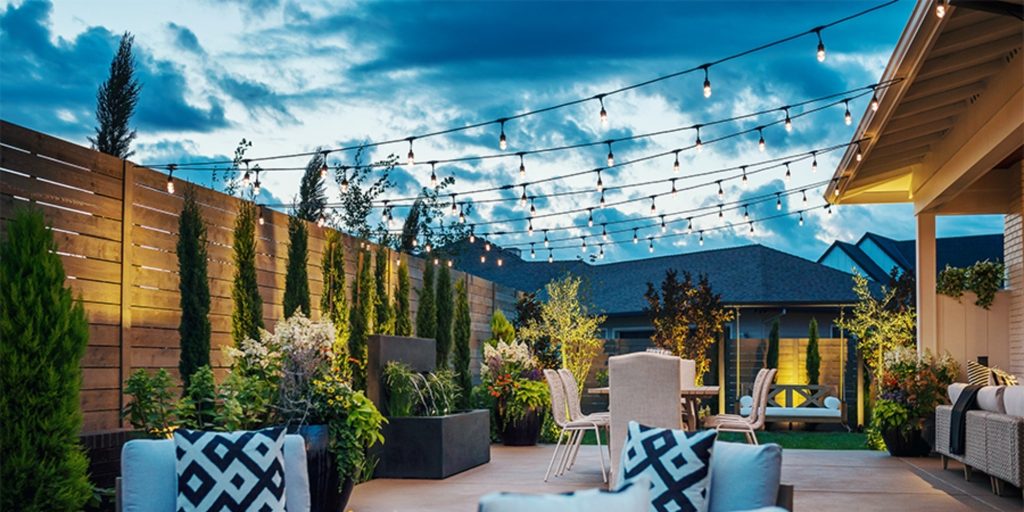 outdoor string lights from house to fence; how to hang outdoor string lights from house to fence